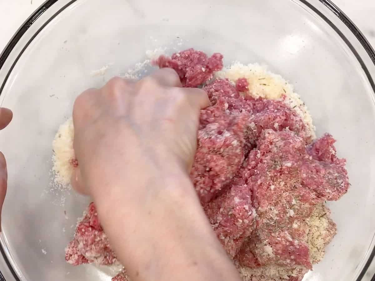 Mixing the meatloaf ingredients.