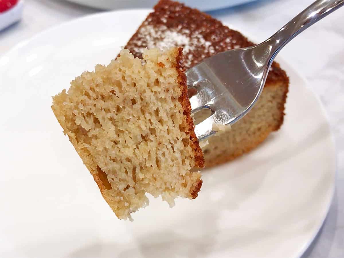 The cake has a moist and fluffy texture.