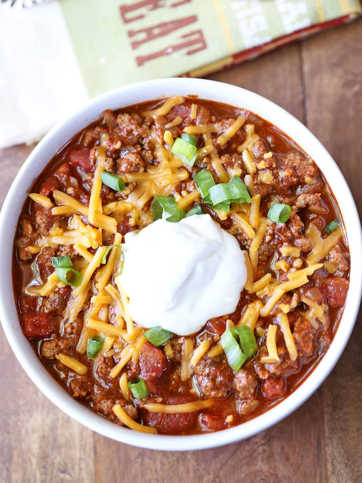 No-bean chili is served in a white bowl with a napkin.