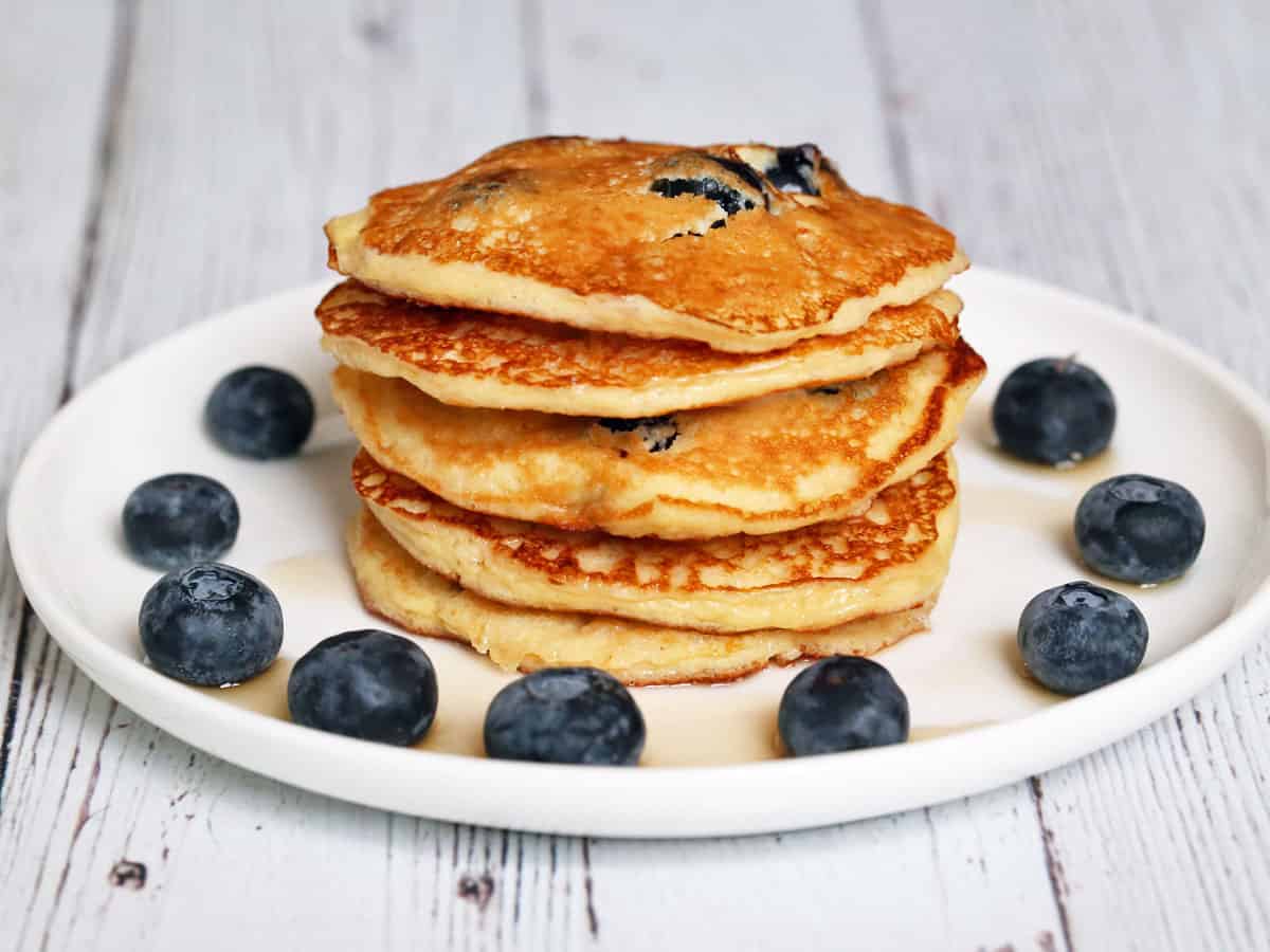 A stack of blueberry protein pancakes.