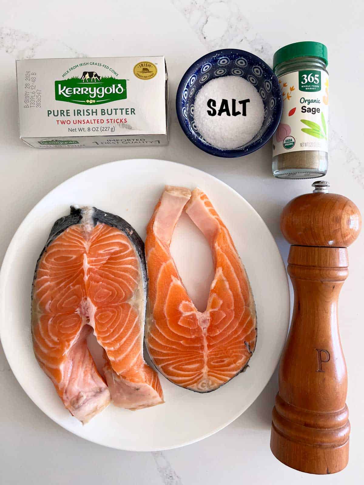 The ingredients needed to cook salmon steaks.