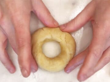 Shaping the bagels.