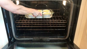 Placing the souffle in the oven.
