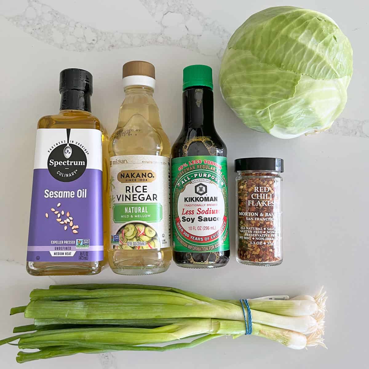 The ingredients needed to make an Asian cabbage salad.