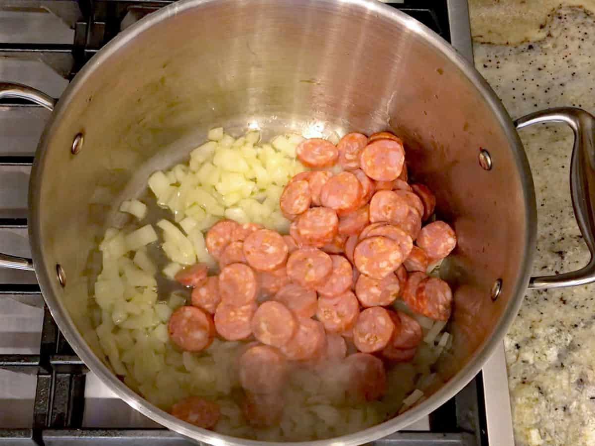 The sausage was added to the saucepan.