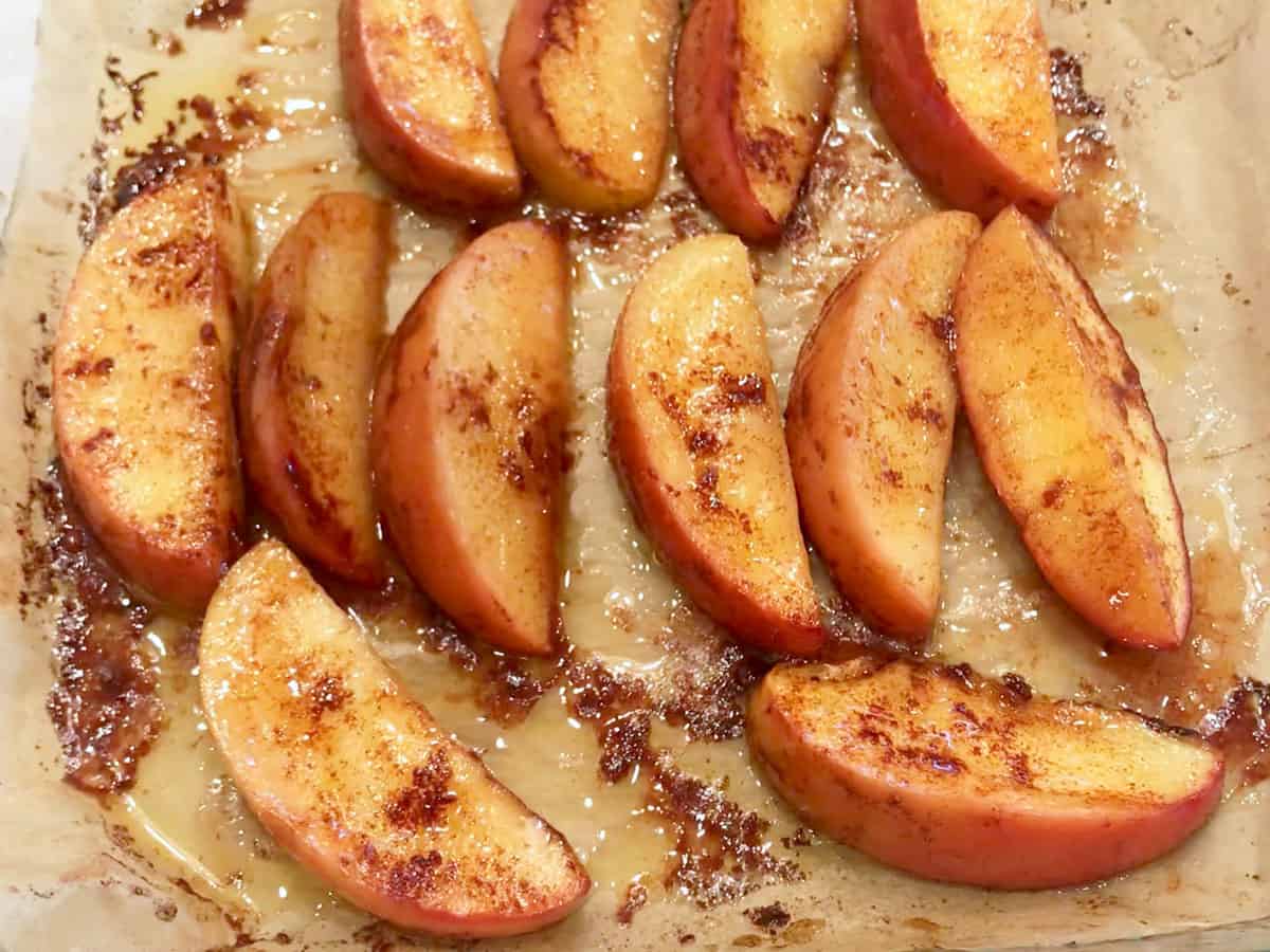 The apples are ready in the pan.