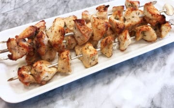 The chicken kabobs are served.