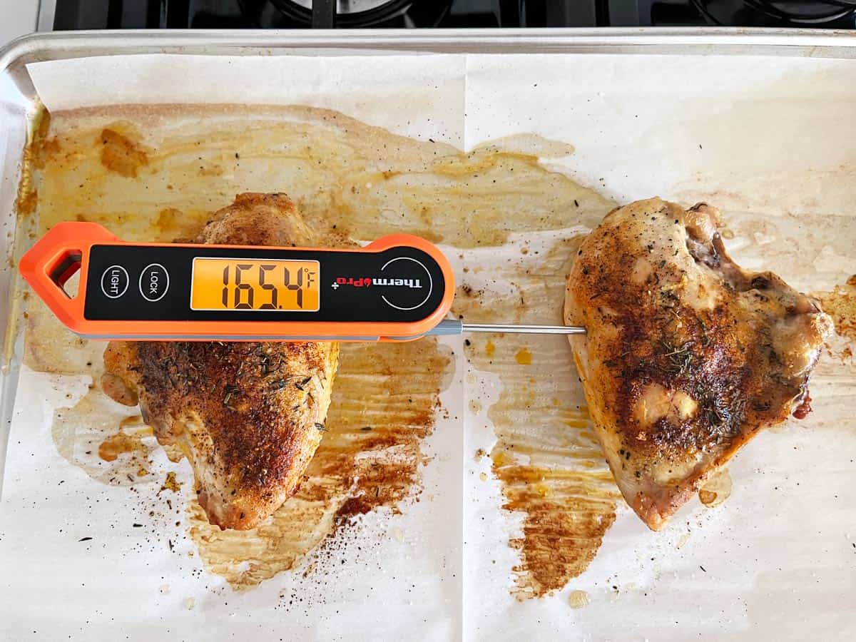 The chicken is ready. Its internal temperature is 165.4 degrees Fahrenheit.