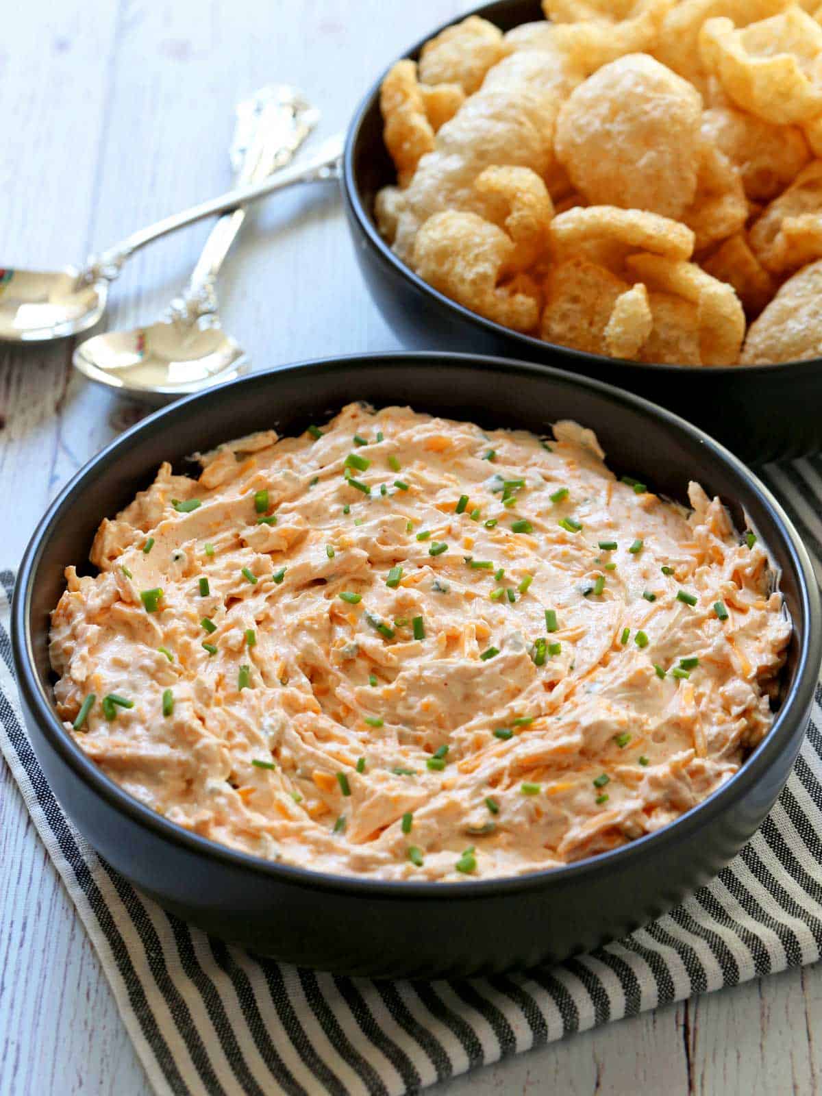 Cream cheese dip is topped with chives.