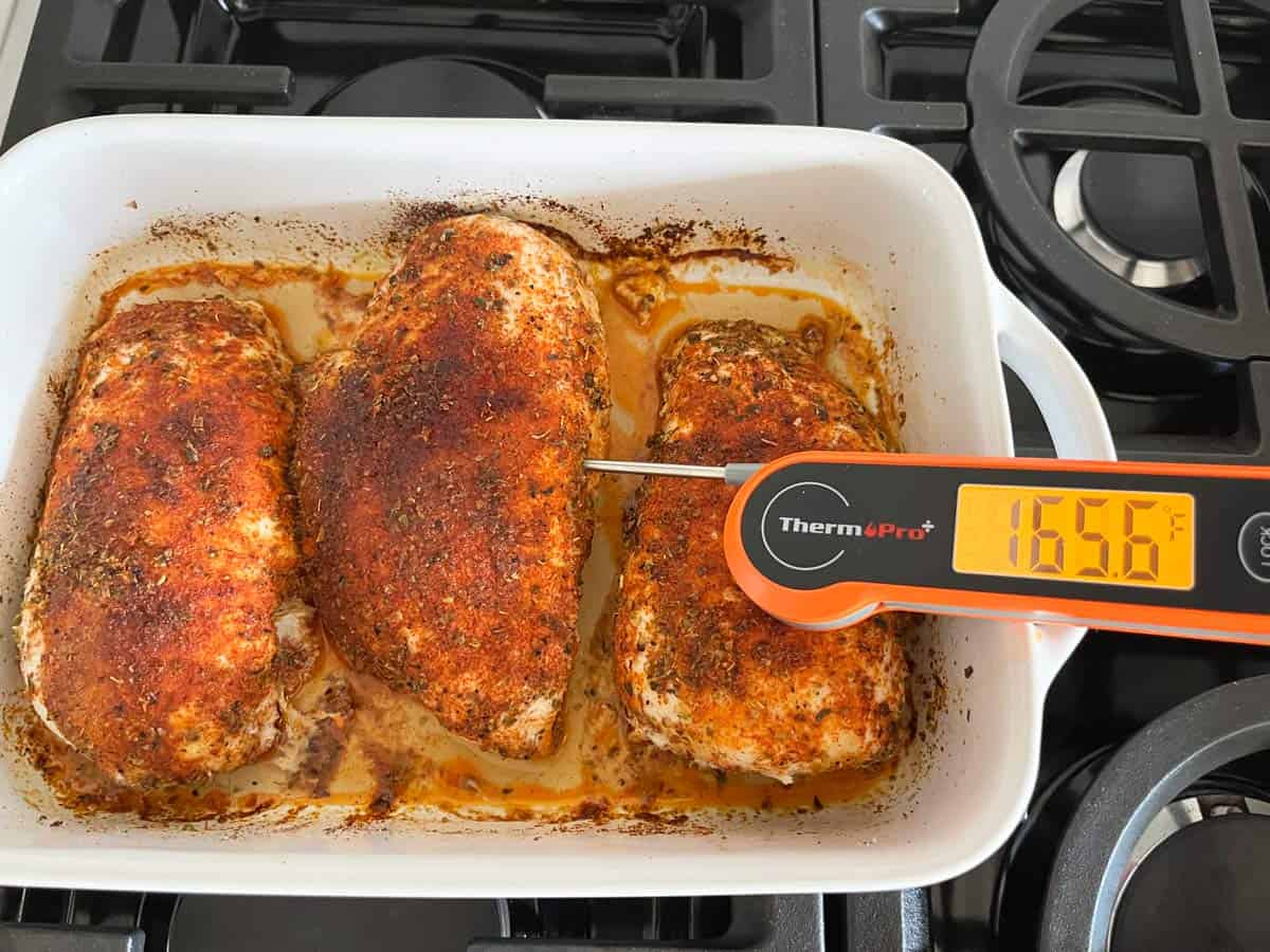 A chicken breast with an internal temperature of 165.6°F.