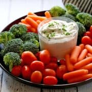 Sour cream dip served with fresh vegetables.