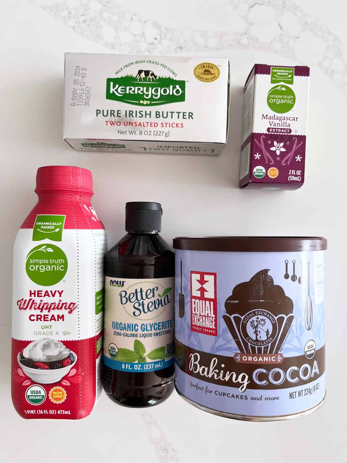 The ingredients needed to make a keto chocolate frosting.