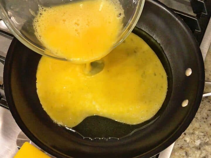 Pouring the eggs to the skillet.