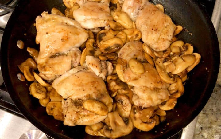 The chicken was added back to the skillet.