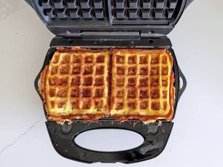 The chaffles are ready in the waffle iron.