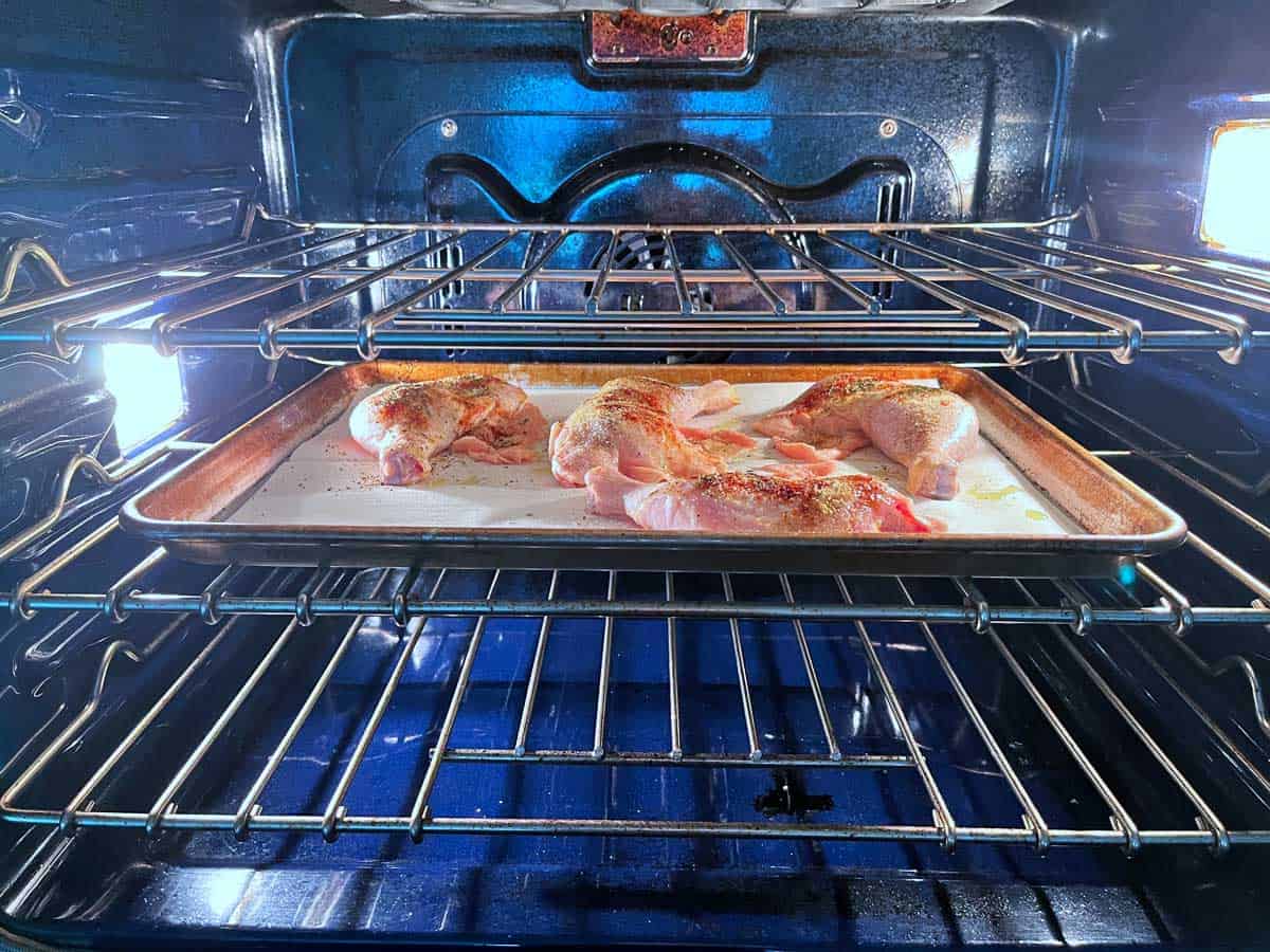Chicken leg quarters in the oven.