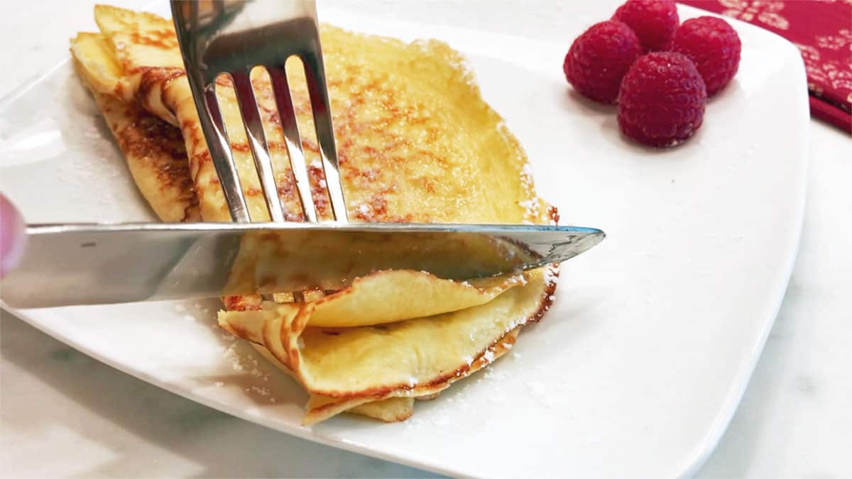Keto crepes are served with berries.
