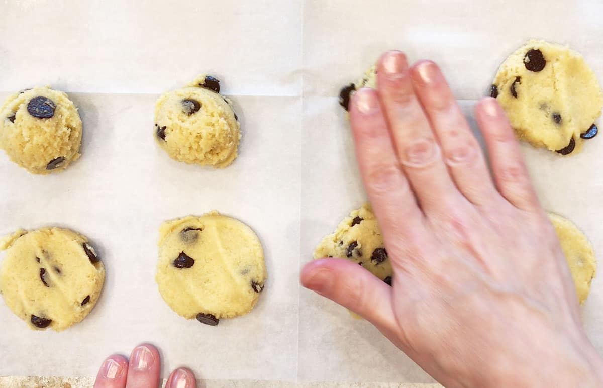 Flattening the cookies.