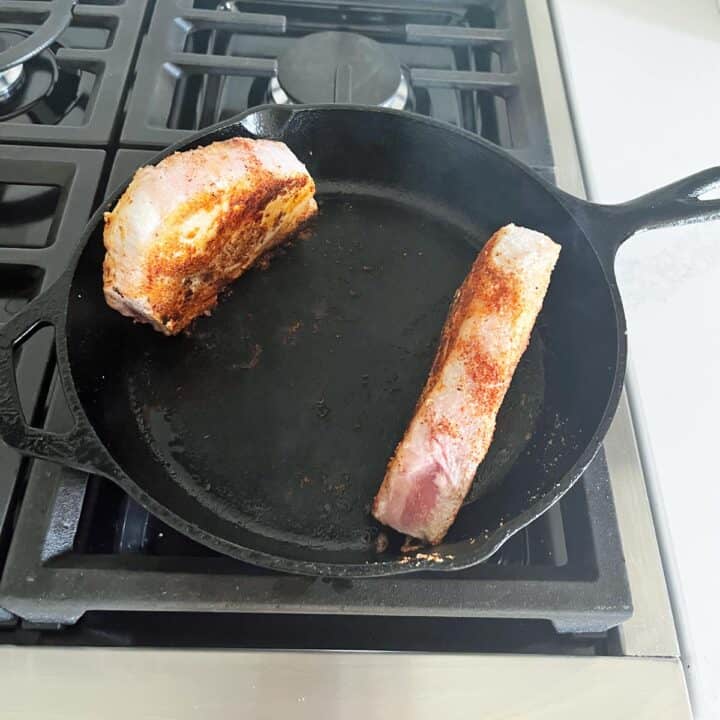 Cooking pork chop edges.