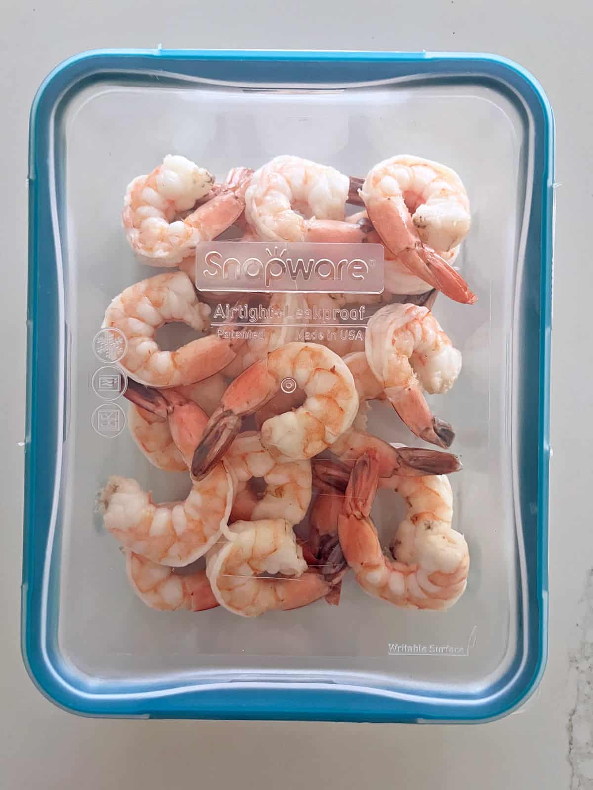 Leftover shrimps stored in a glass container.