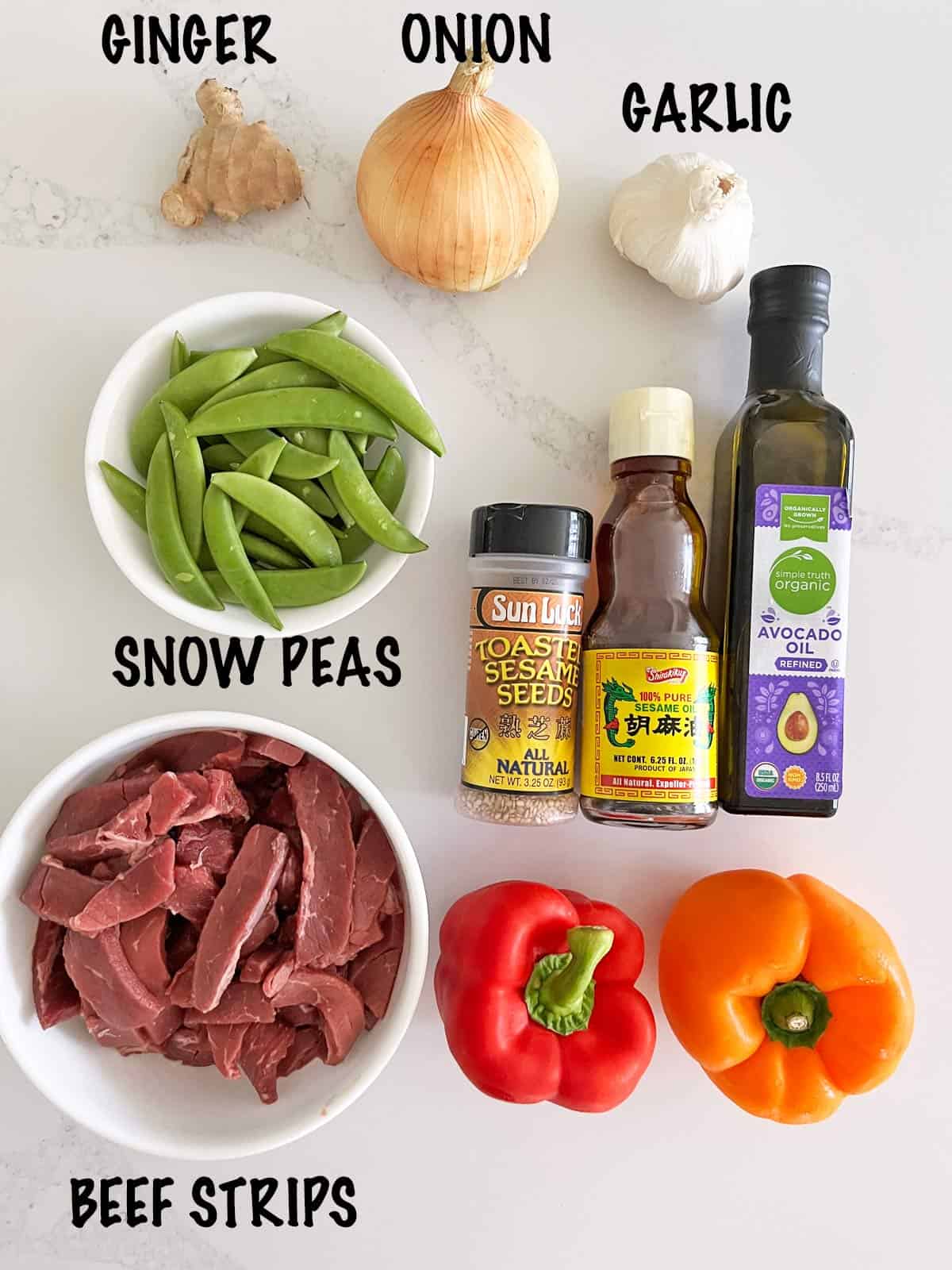 The ingredients needed for a steak stir-fry.