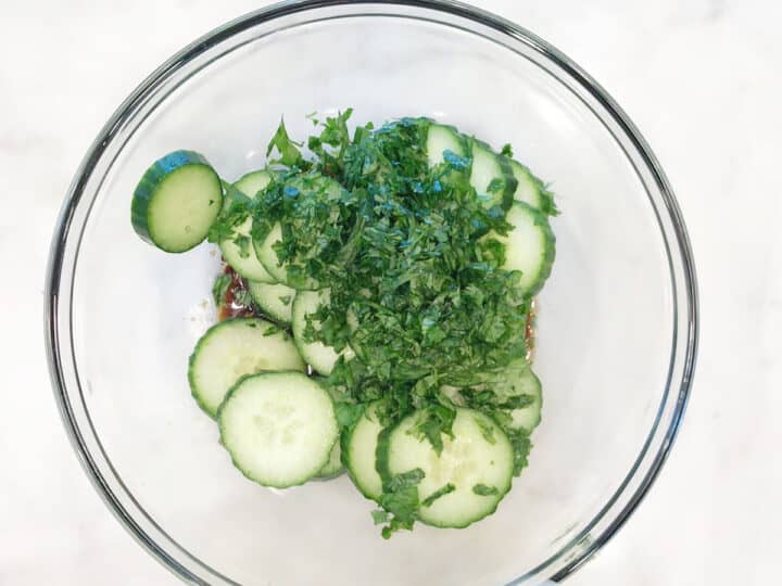 Adding cucumber and cilantro.
