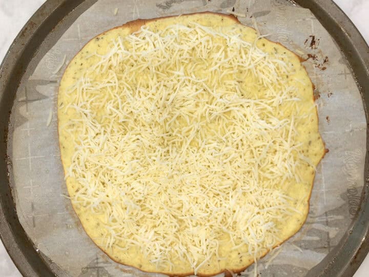 Provolone was added to the baked crust.