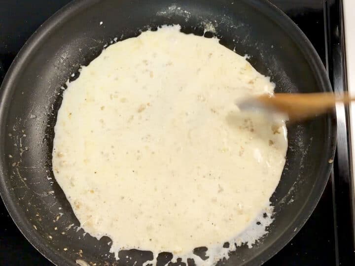 Heavy cream was added to the skillet.