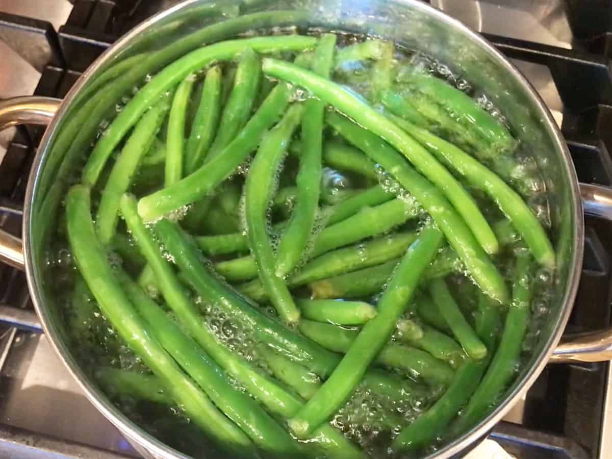 Boiling the green beans.