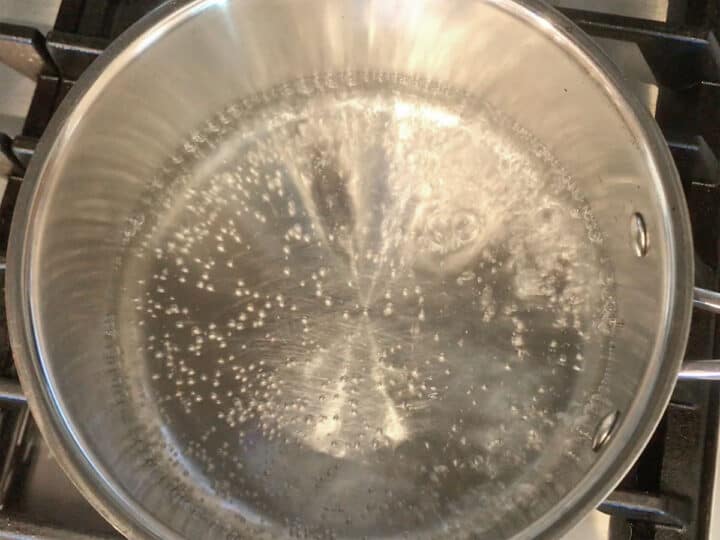 Boiling water in a saucepan.