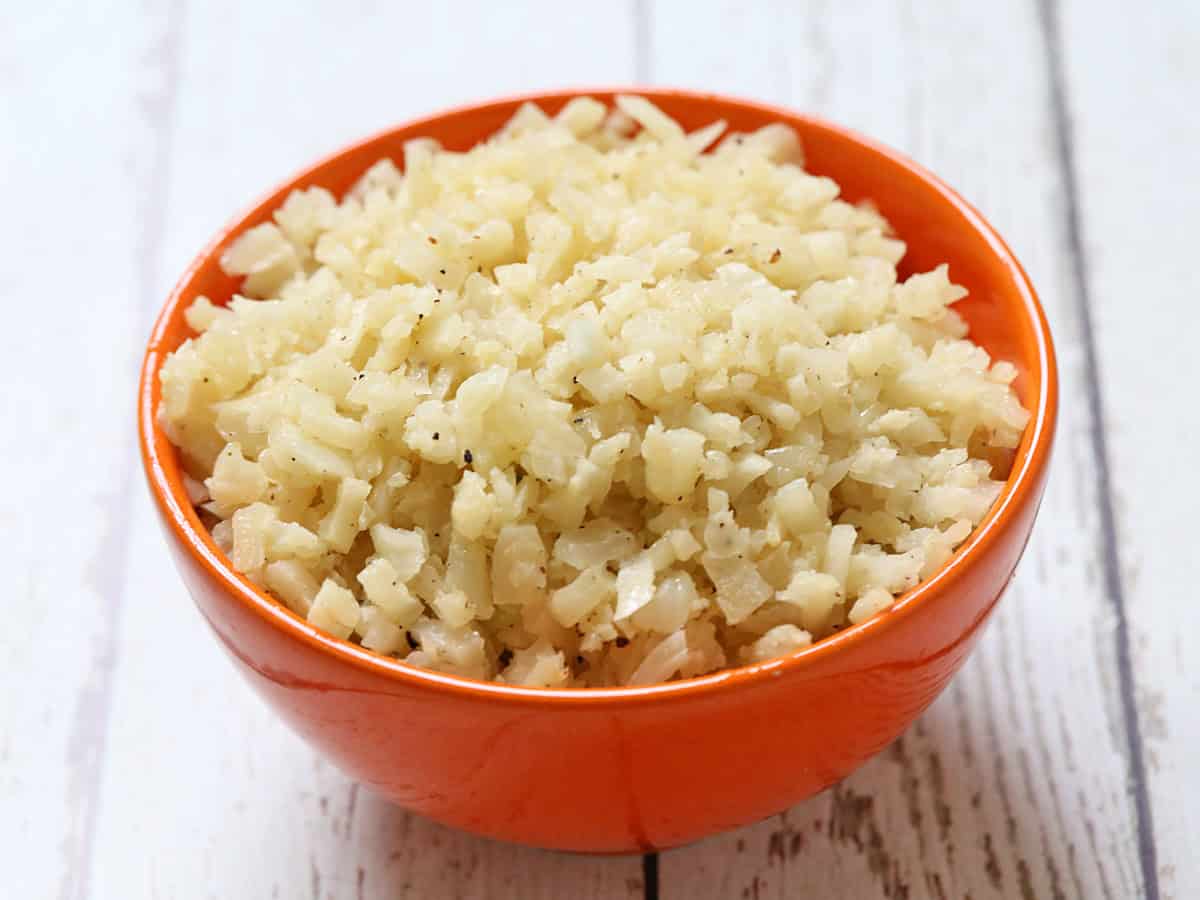 Cauliflower rice is served in a bowl.