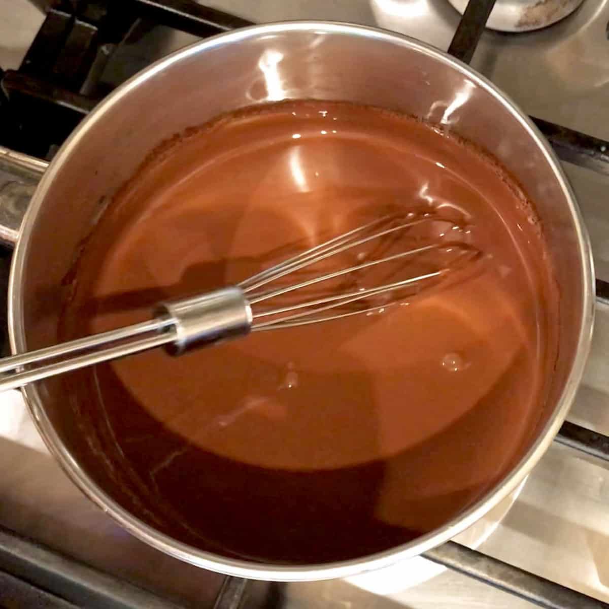 Melting the chocolate mixture on the stovetop.