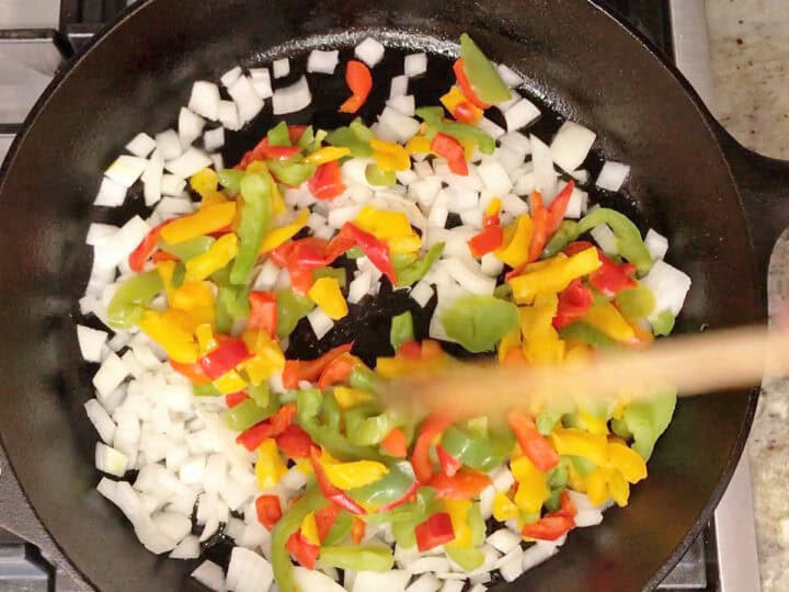 Cooking onions and peppers.