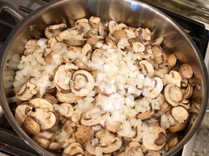 Cooking the mushrooms and onions.