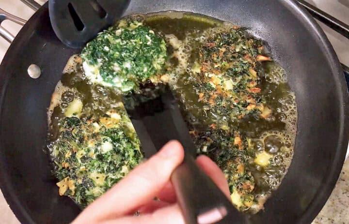 Cooking the fritters in a skillet.