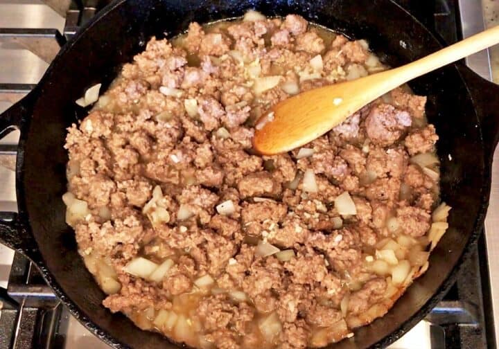 The ground beef and onions were cooked.