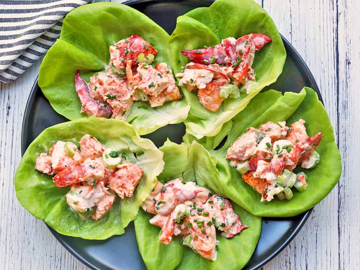 Lobster salad is served in lettuce wraps.