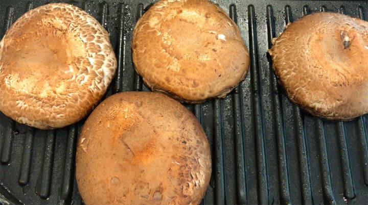 The mushrooms were placed on the grill.