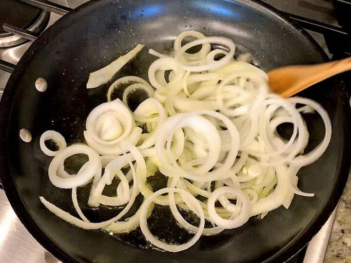 The onions were added to the skillet.