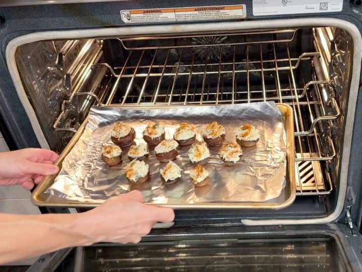 Placing the mushrooms in the oven.