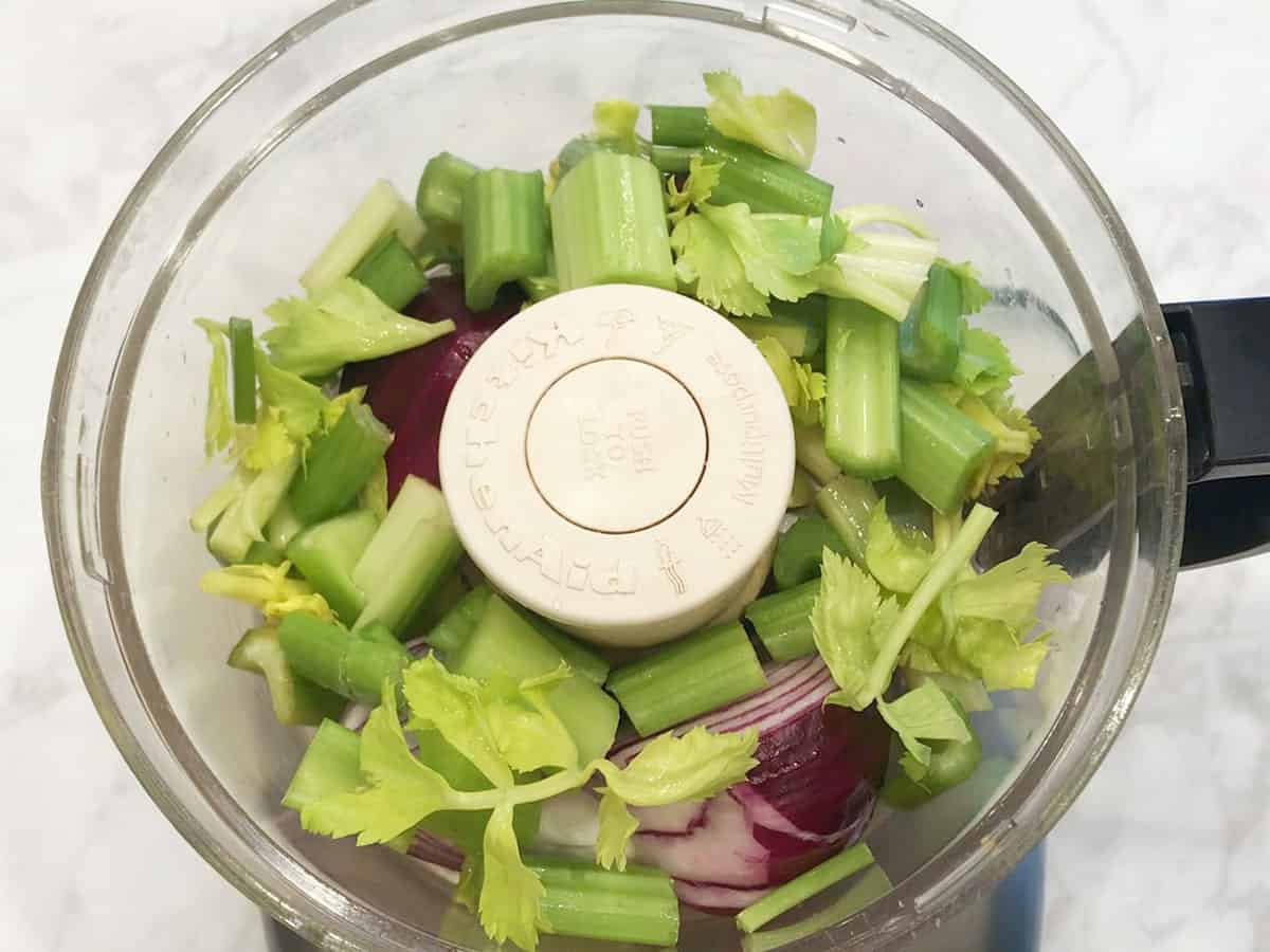 The vegetables were placed in the food processor.