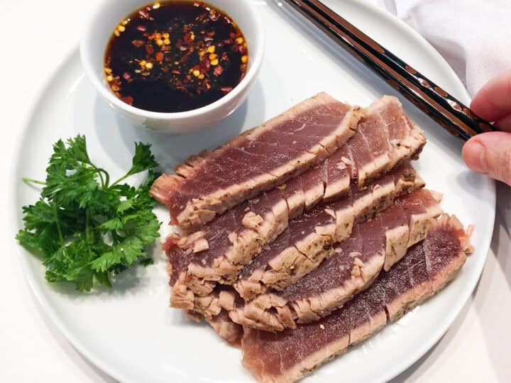 The tuna is served with the dipping sauce.