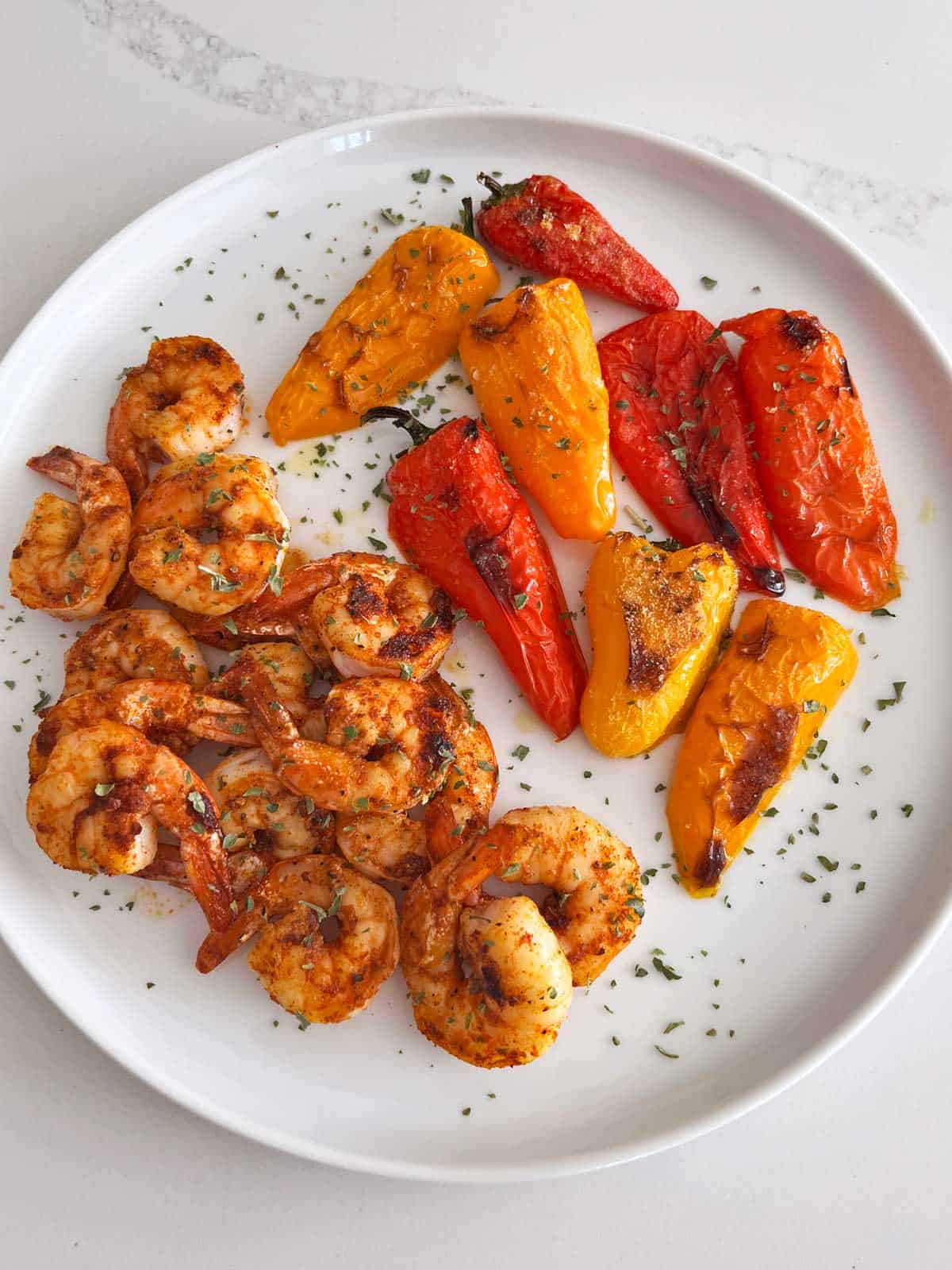 The peppers are served with shrimp.