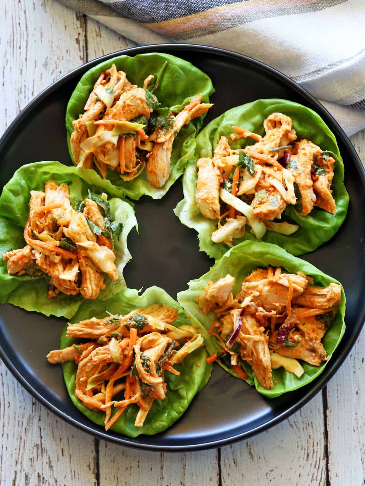 Thai chicken salad is served in lettuce cups.