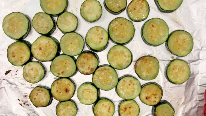 Zucchini slices on the pan after they were broiled.