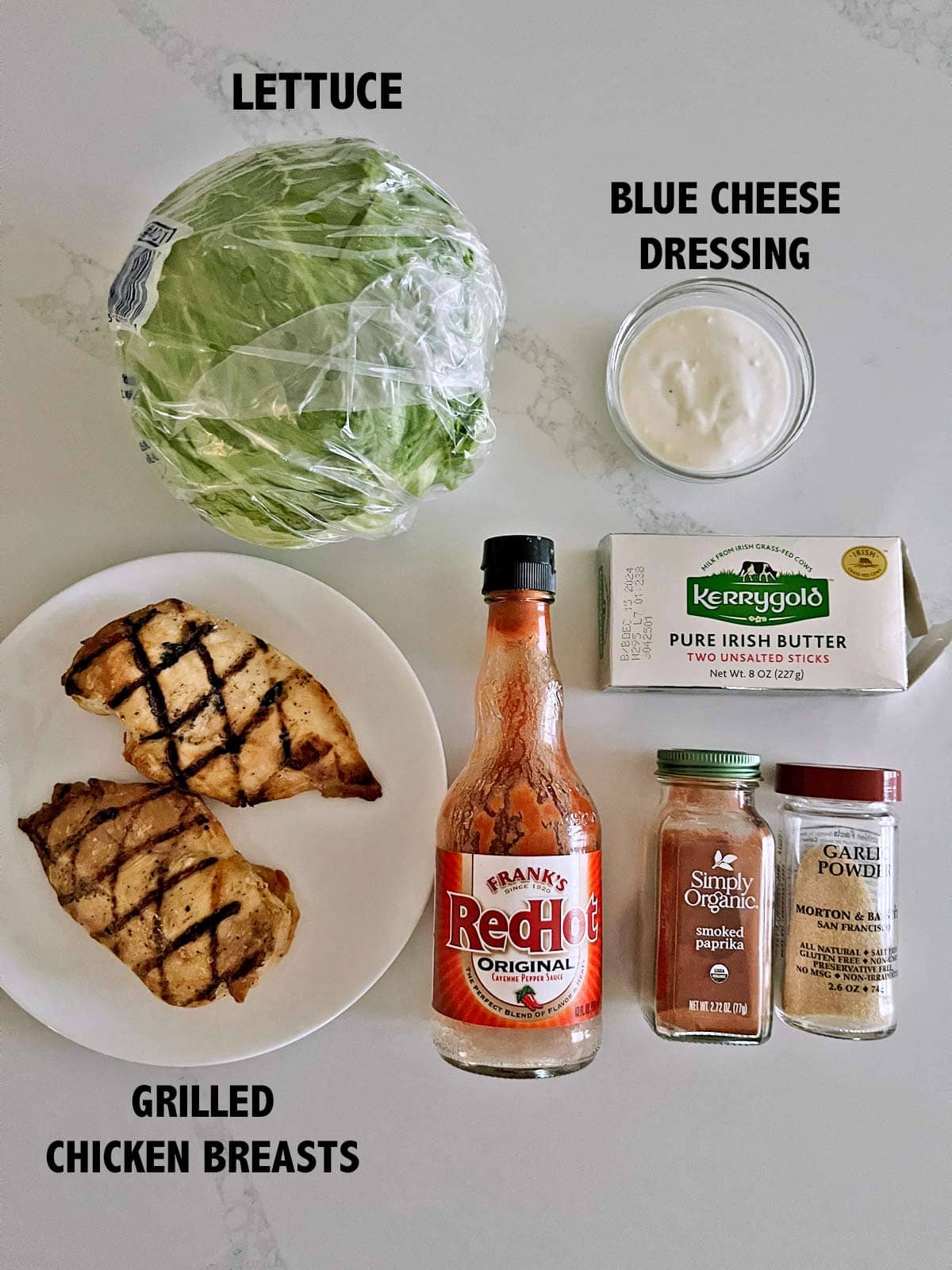 The ingredients needed to make buffalo chicken lettuce wraps.