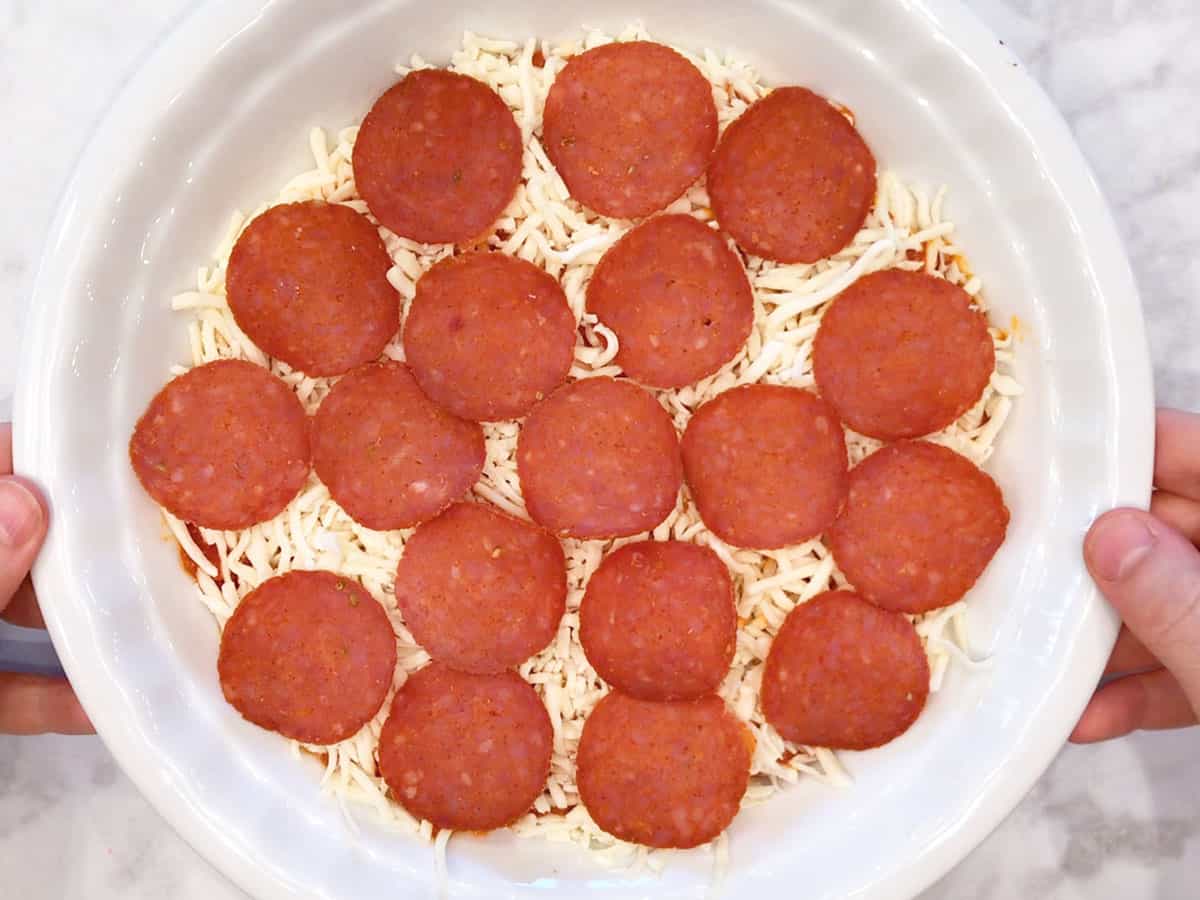 Cheese and pepperoni were added.