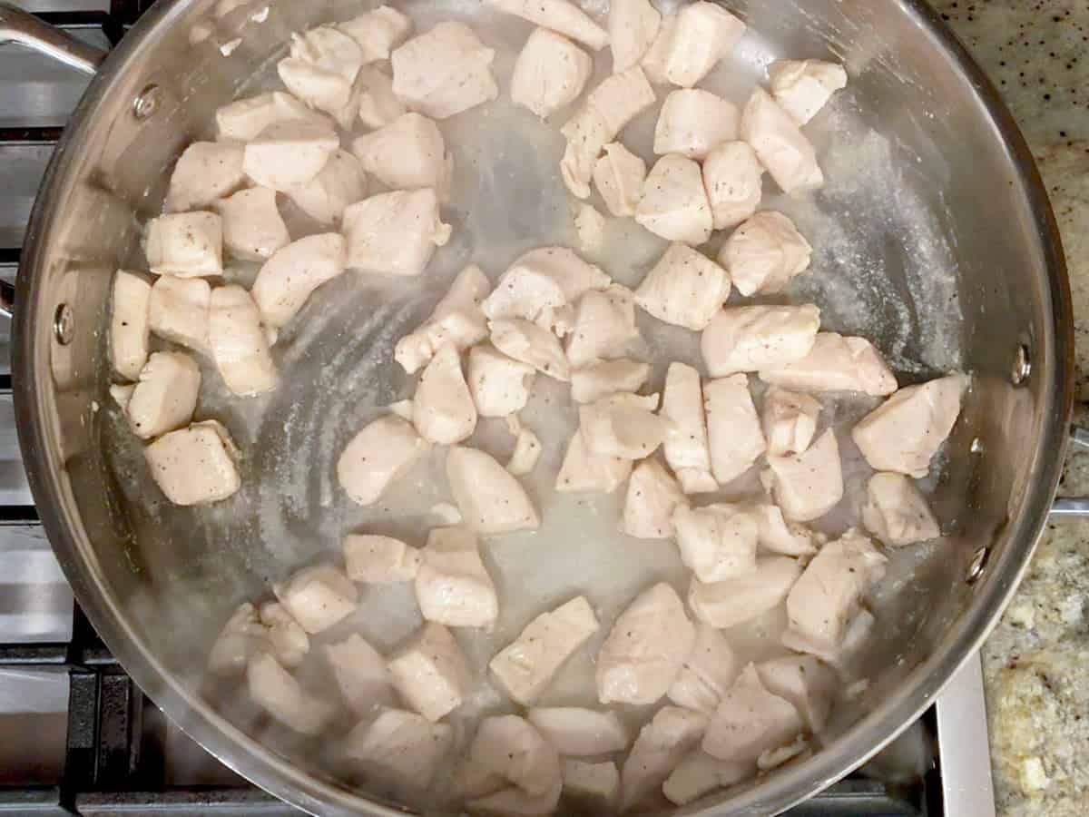 Cooking the chicken cubes.