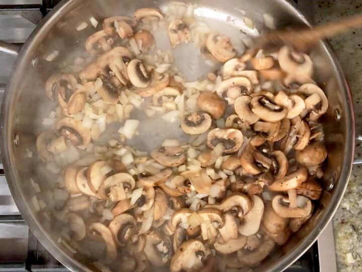 Cooking the onions and mushrooms.