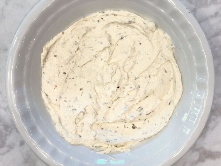 The cream cheese layer was added to the pan.